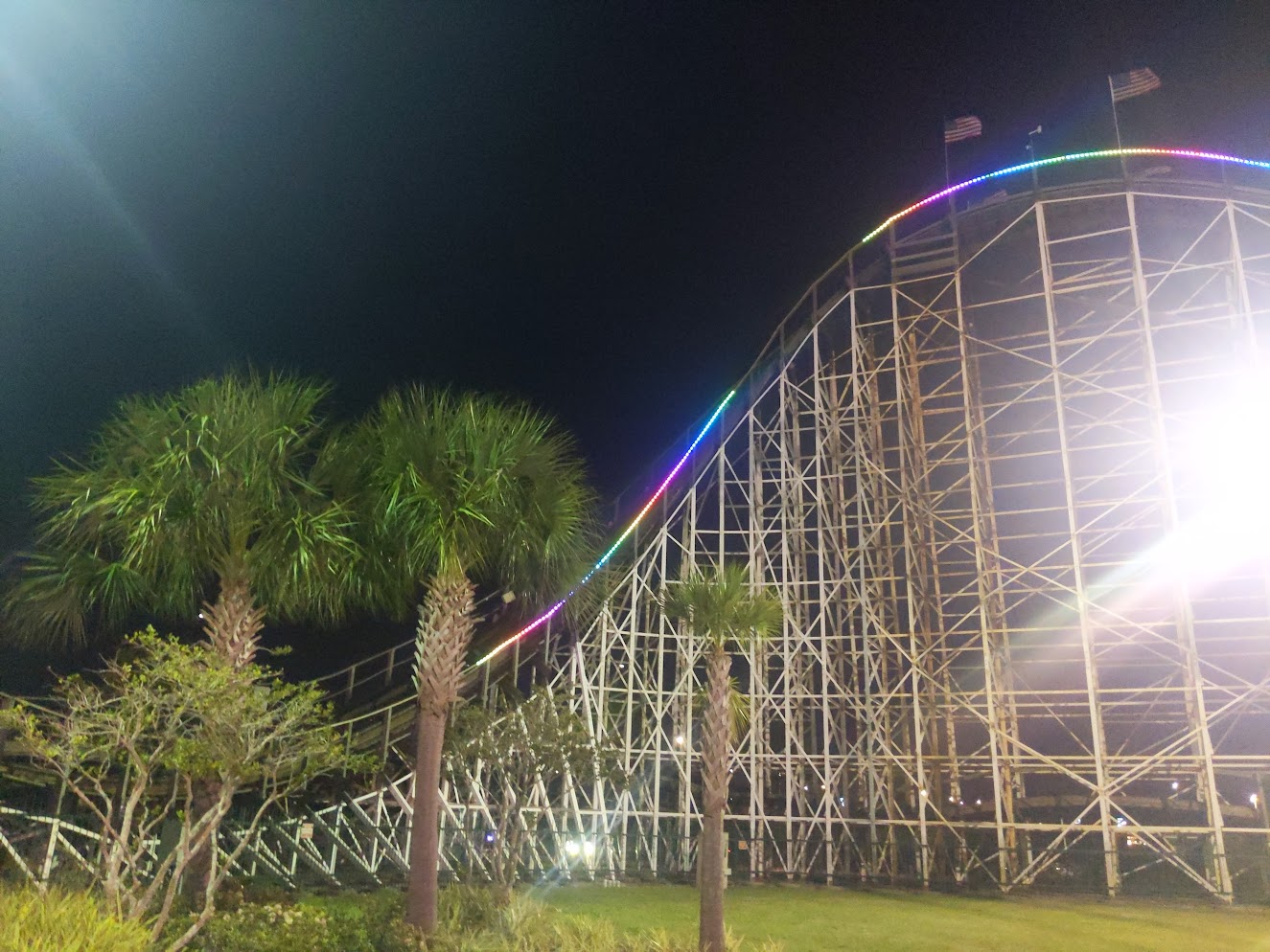 White Lightning's first drop, its lit up with rainbow leds down the railing.